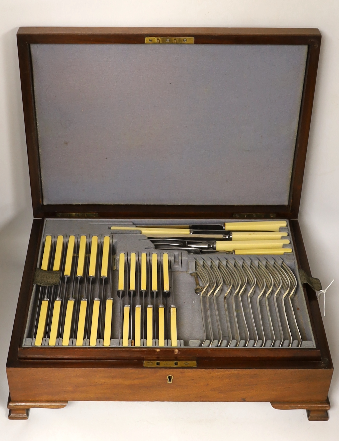 A Southern & Richardson silver plated canteen of flatware, with key